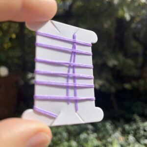 1 Meter Flechtschnur mit präparierten Spitzen 0,5 mm  - flieder