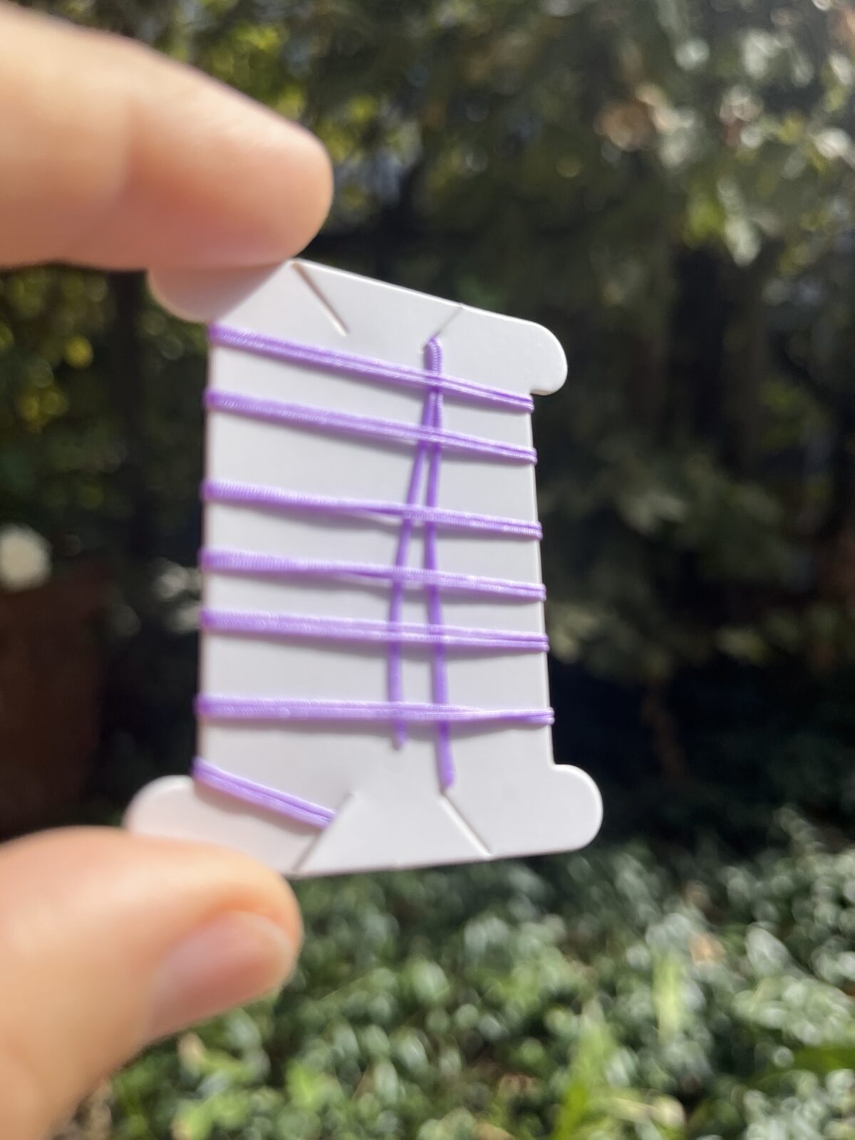 1 Meter Flechtschnur mit präparierten Spitzen 0,5 mm - flieder