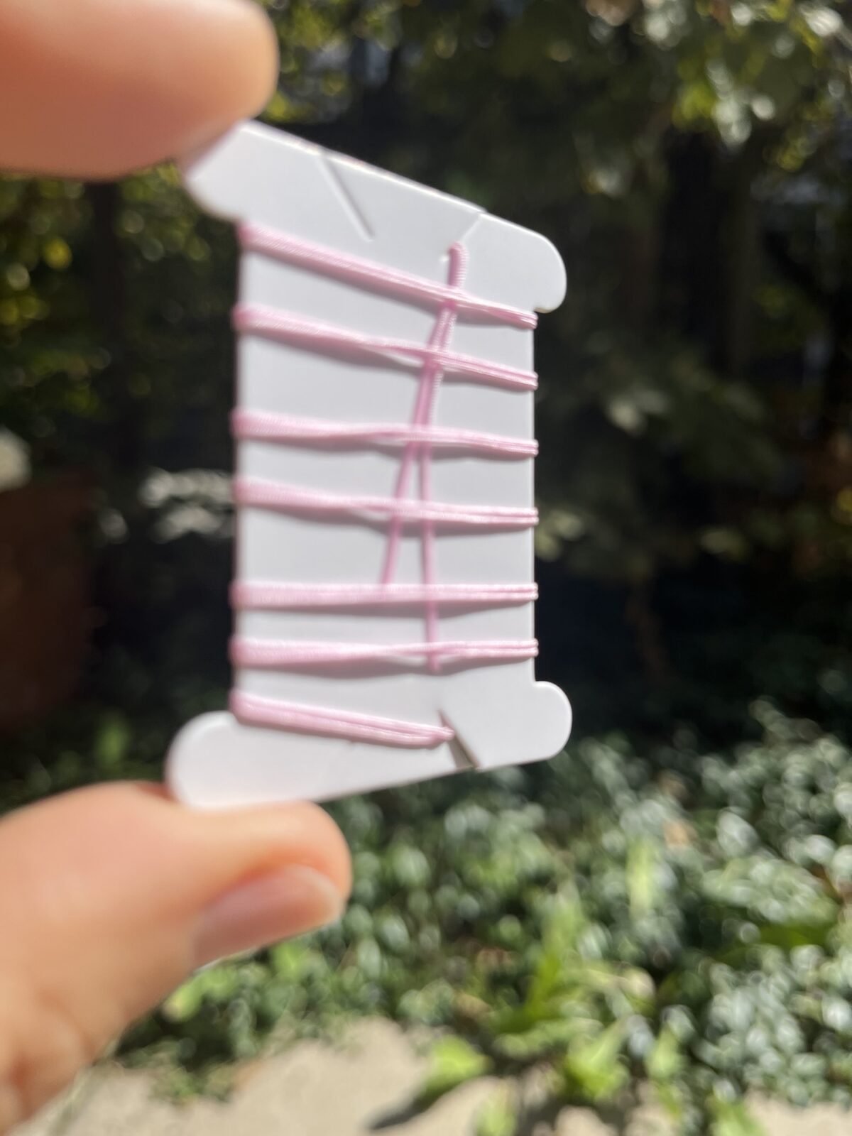 1 Meter Flechtschnur mit präparierten Spitzen 0,5 mm - hellrosa